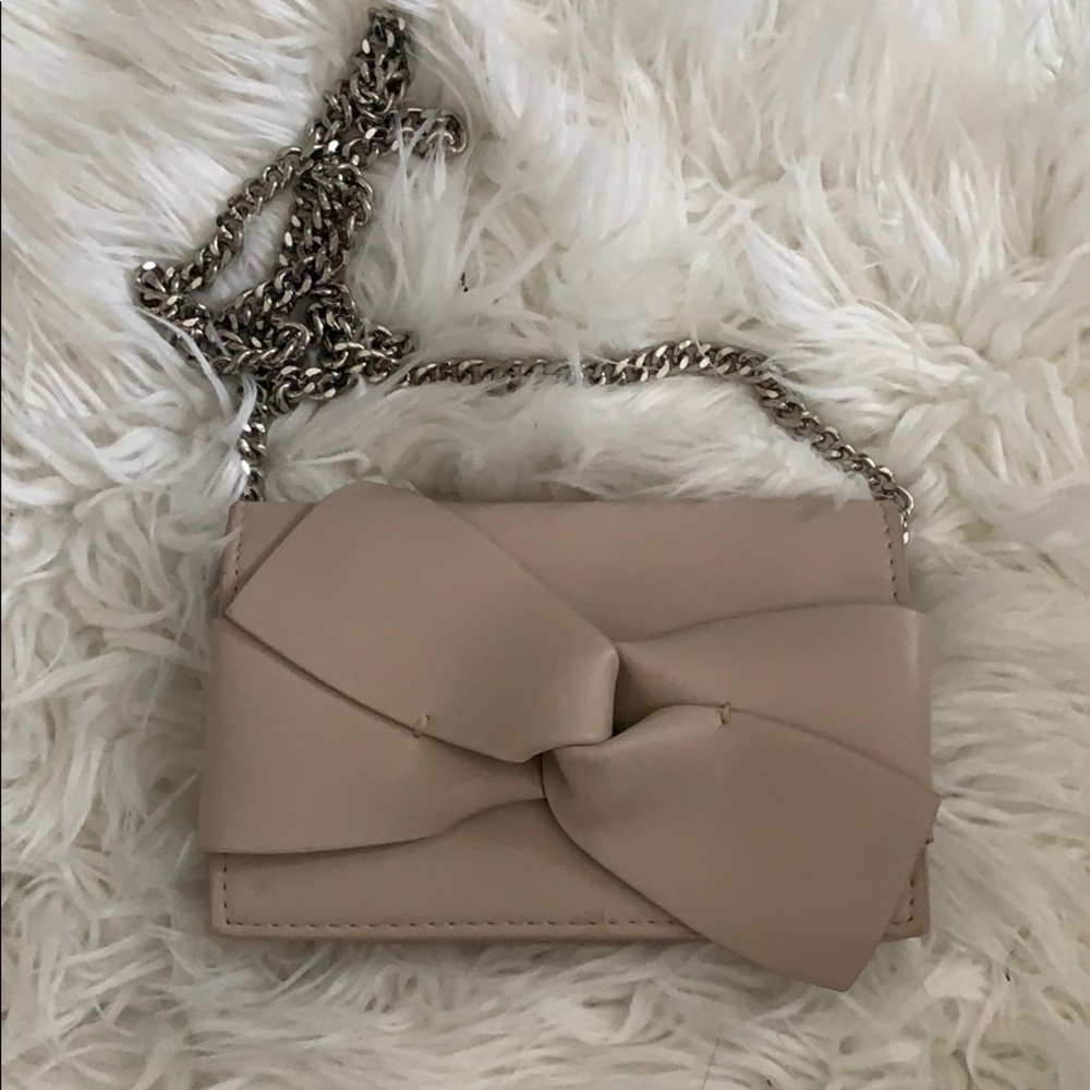 A small crossbody purse